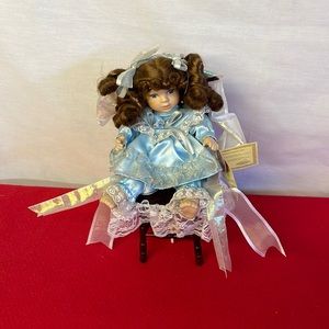 Collectors Choice Musical windup doll Catherine in Chair